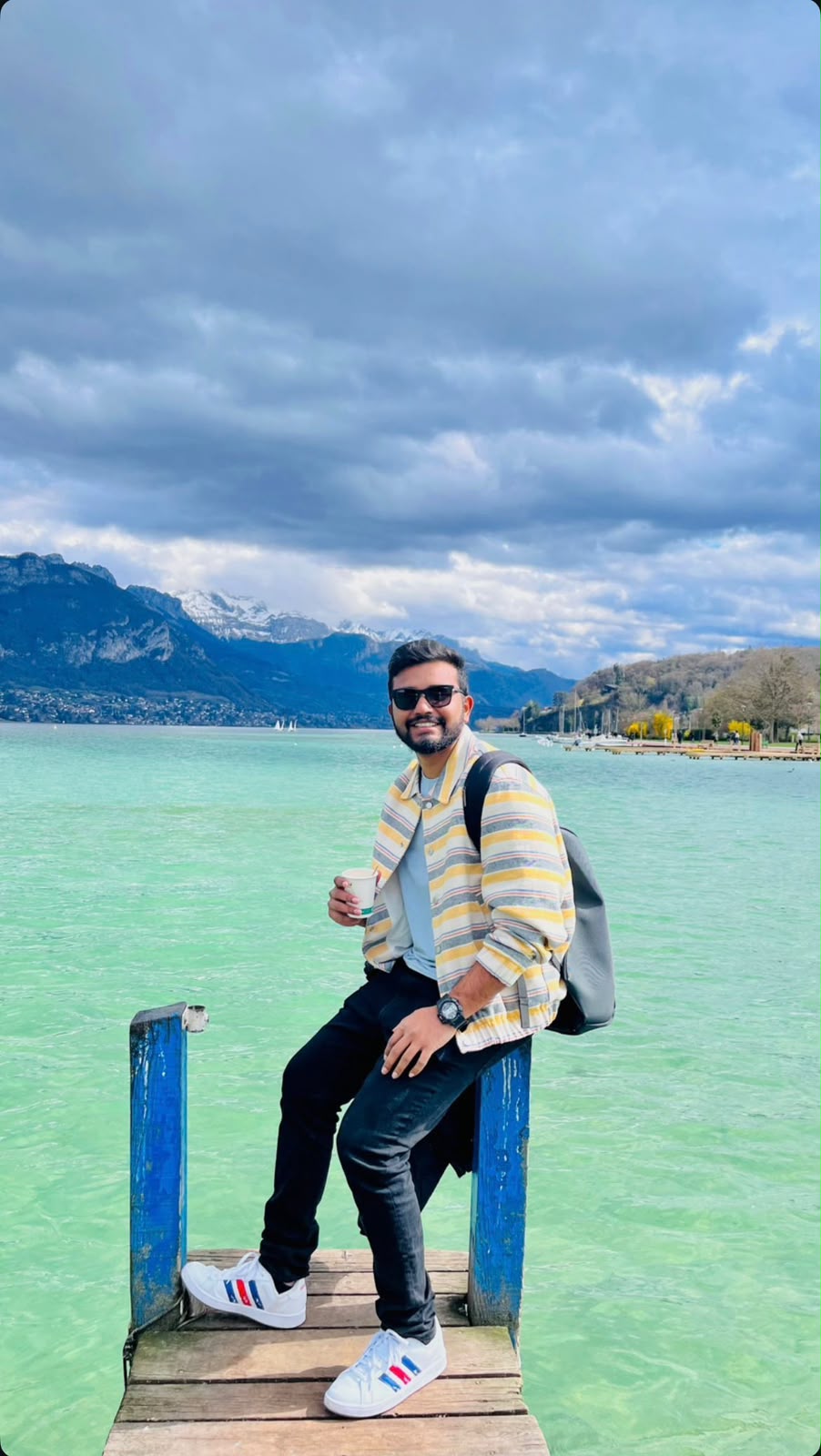 Amal beside a mountain lake